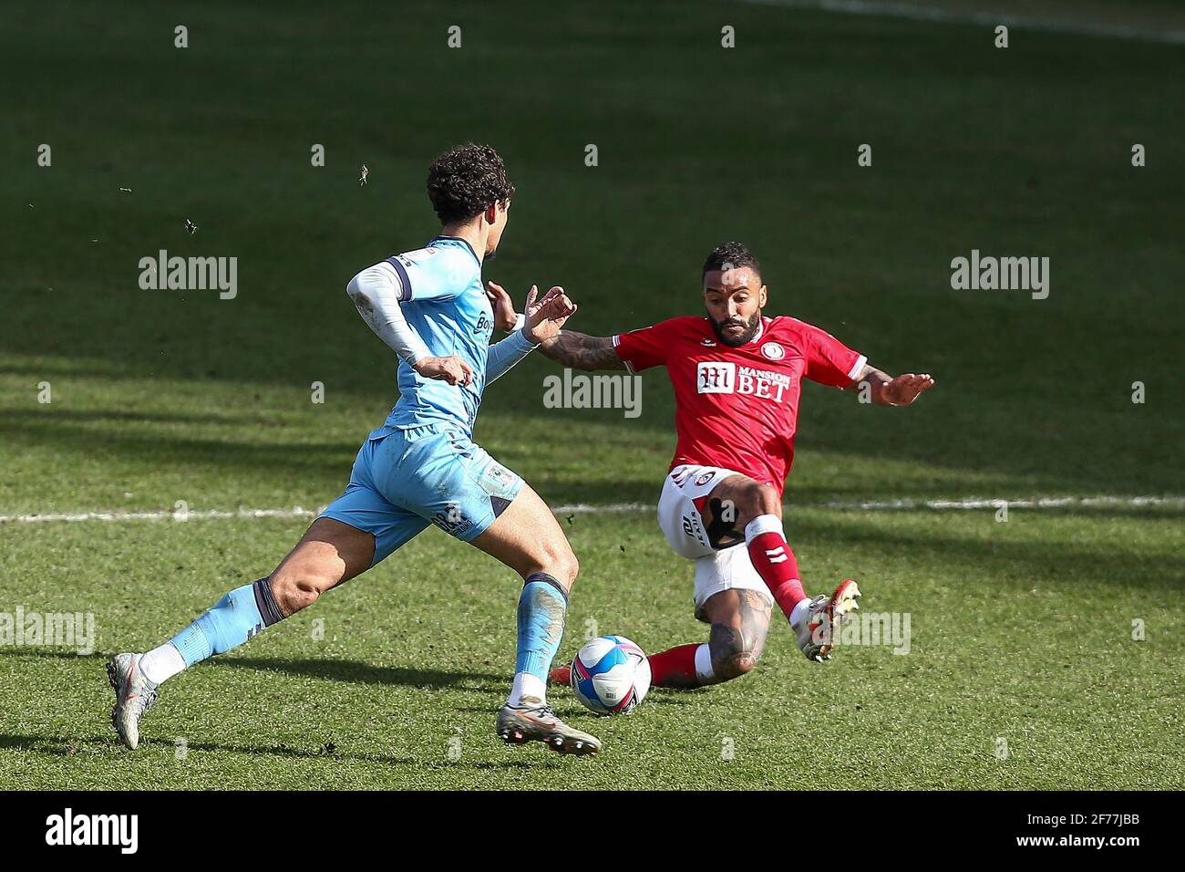 Birmingham, UK. 05th Apr, 2021. Tyler Walker #19 of Coventry City is tackled by Danny Simpson #29 of Bristol City in Birmingham, UK on 4/5/2021. (Photo by Simon Bissett/News Images/Sipa USA) Credit: Sipa USA/Alamy Live News Stock Photo