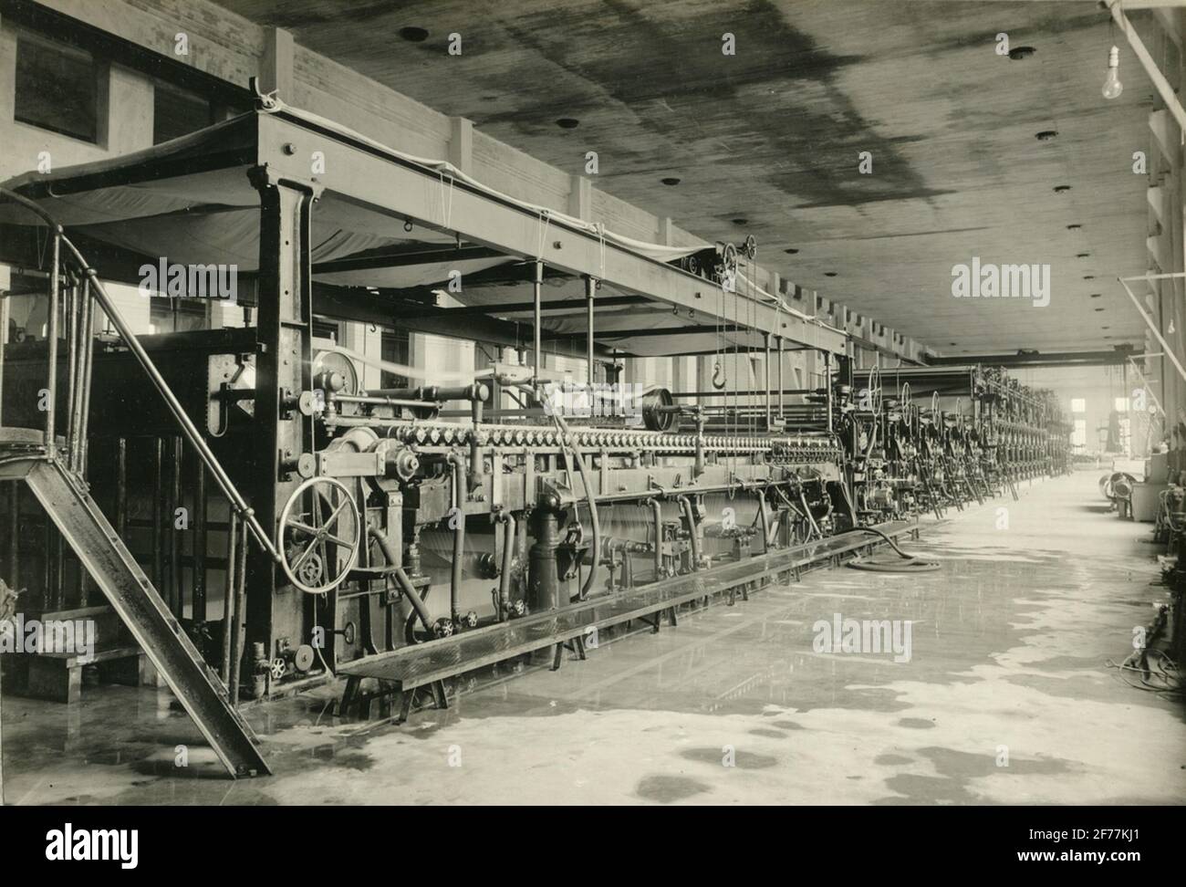 Paper industry machinery. Made at KMW for Billeruds AB, Säffle. Paper width 3050 mm. From the album for KMW. AB Karlstad's mechanical Werkstad. Stock Photo