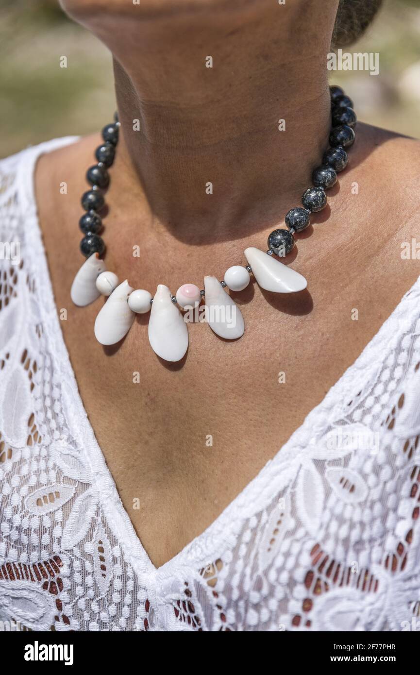 France, Caribbean, French West Indies, Guadeloupe, Island of La Désirade, Grande Anse, creation of the lapidary workshop Dési'Jaspe, necklace in queen conch shell and gabbro pearls Stock Photo