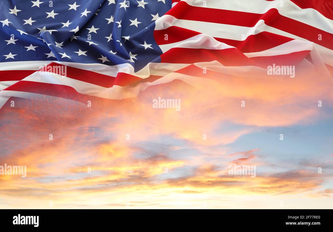 American flag in sunny sky Stock Photo - Alamy
