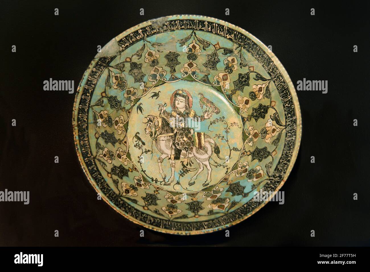 Iran, Tehran, Museum of Islamic Art, Enameled and gilded pottery bowl with Kufic and Naskh inscriptions (Ray, 12-13th century) Stock Photo