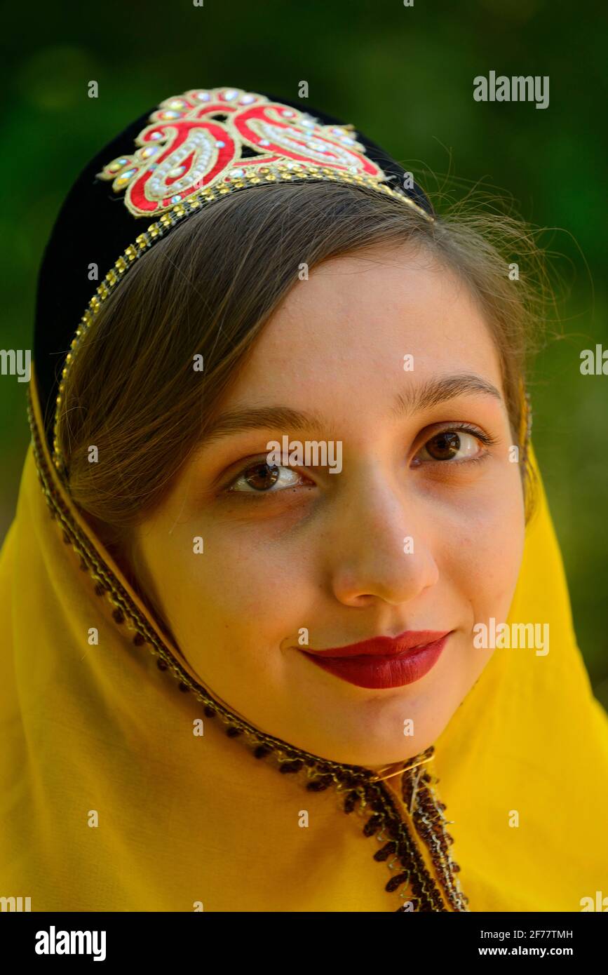 Iran, Shiraz, Naranjestan garden, Young woman wearing the Qajar traditional dress Stock Photo