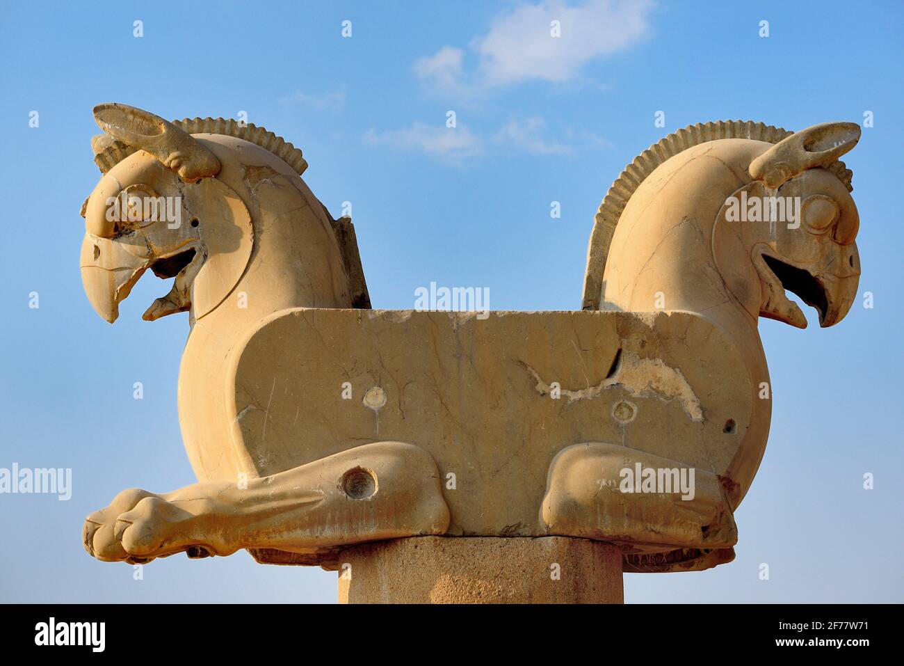Iran, Persepolis, listed as World Heritage by UNESCO, Huma (Homa) bird column capital, (Circa 500 BC) The Huma bird is said to never come to rest, living its entire life flying invisibly high above the earth, and never alighting on the ground Stock Photo