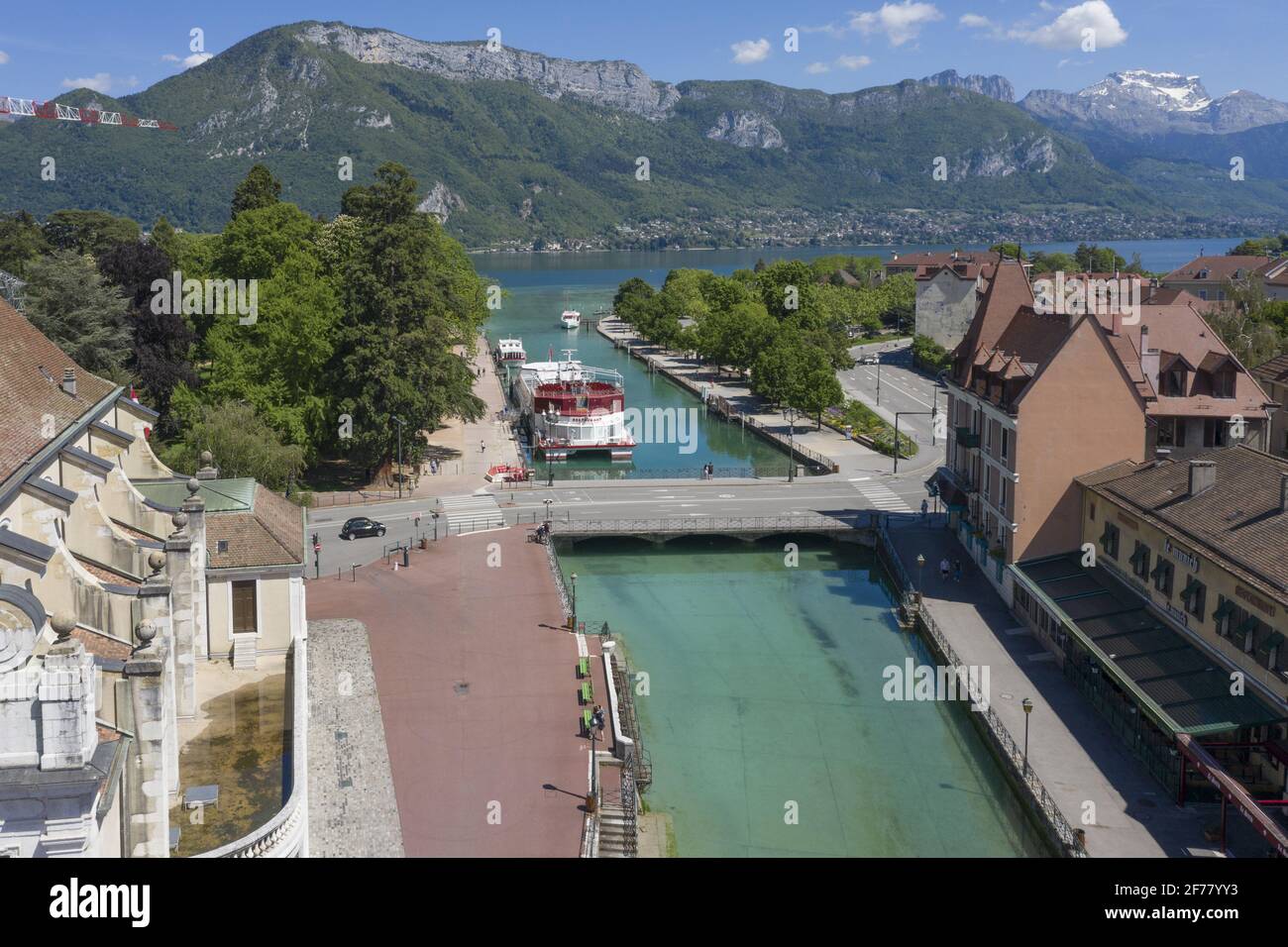 France, Haute Savoie, Annecy, the Thiou canal, and the old town (aerial view), view of the lake, Libellule boat at the quayside Stock Photo
