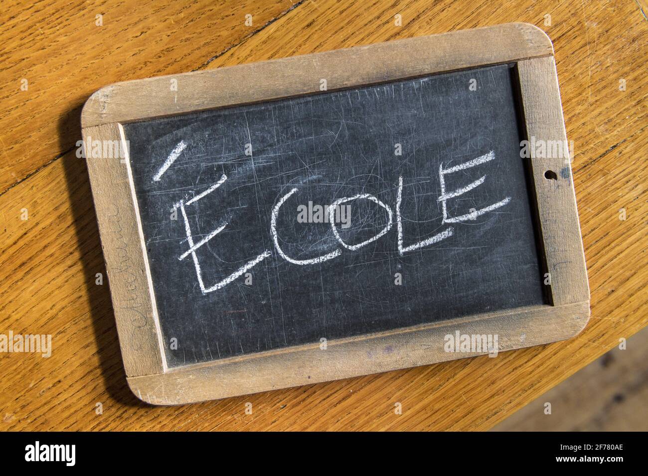 Slate with Ecole (School) inscription Stock Photo