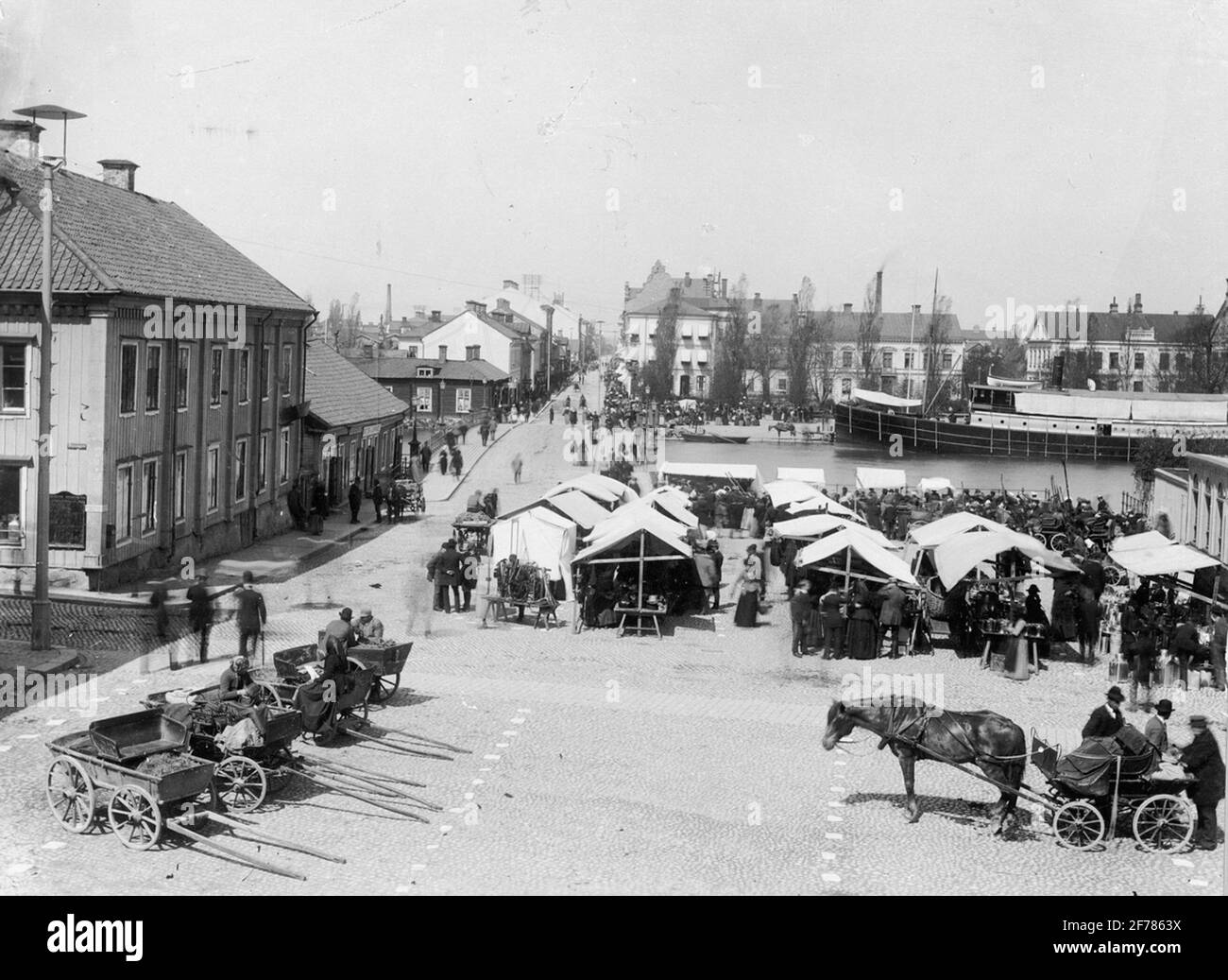 Square market at the River Square at the harbor and Kungsgatan in Eskilstuna before 1895. Stock Photo