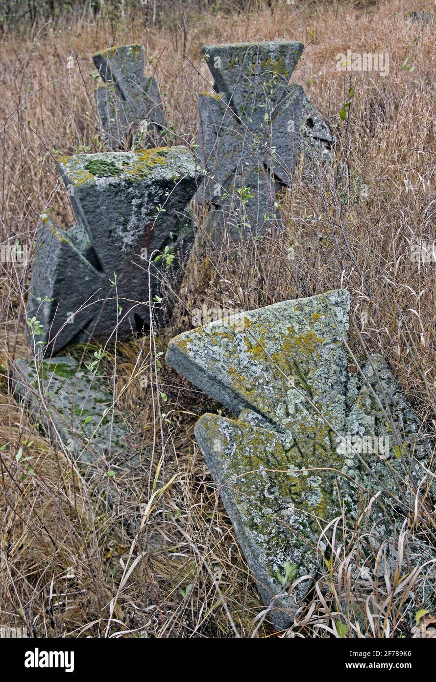 Cross in the cemetery XVIII-XIX centuries. Village Bush Yampolsky region Vinnytsia region, Ukraine Stock Photo