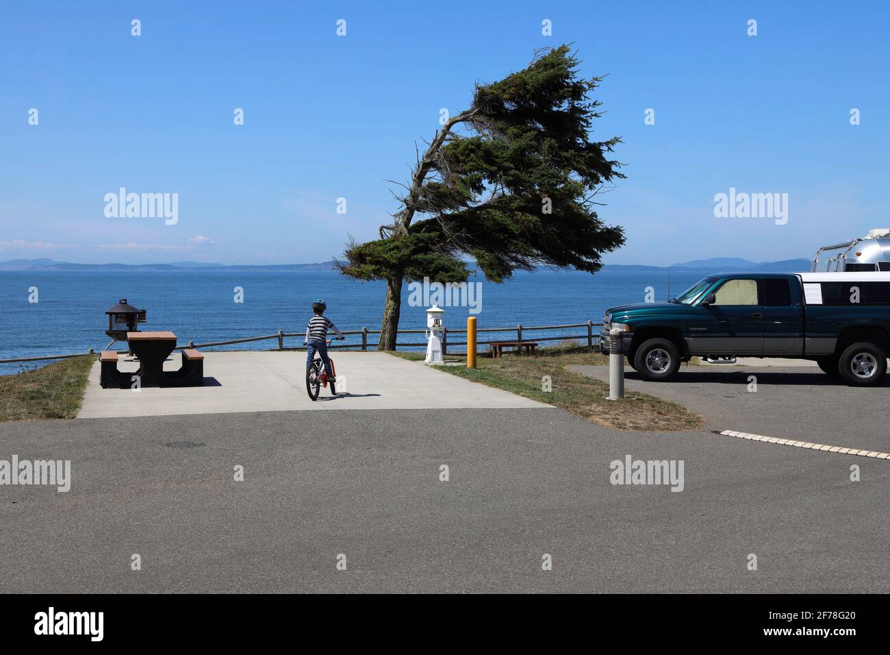 Youngster Bicycling at Cliffside FamCamp, NAS Whidbey Island, Oak Harbor, WA Stock Photo