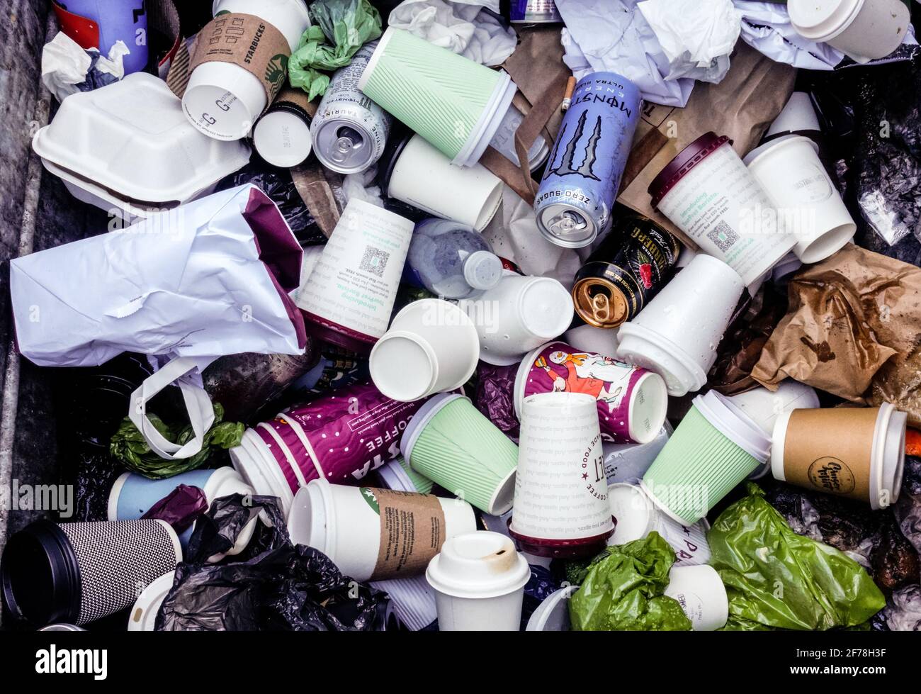 Coffee cups in a waste bin, London, England United Kingdom UK Stock