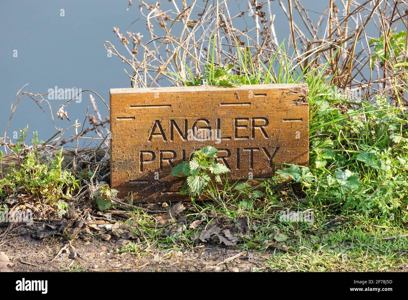 Angler priority sign on fishing spot on the lake, UK Stock Photo