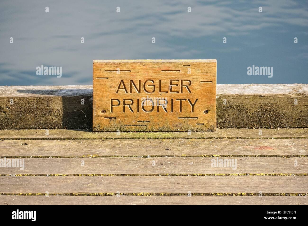 Angler priority sign on fishing spot on the lake, UK Stock Photo