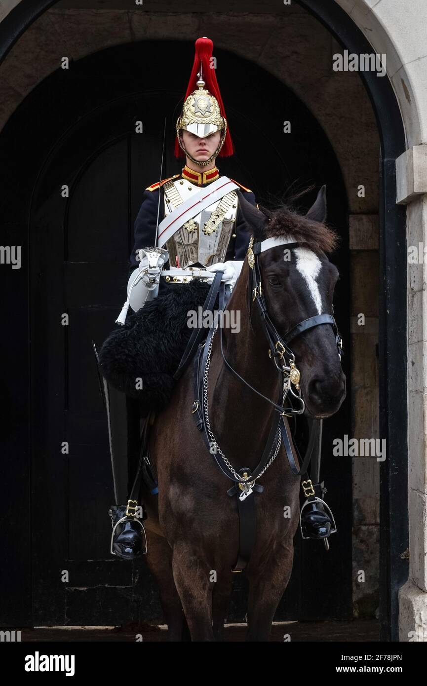 A mounted trooper of the Household Cavalry at Horse Guards, Whitehall, London England United Kingdom UK Stock Photo