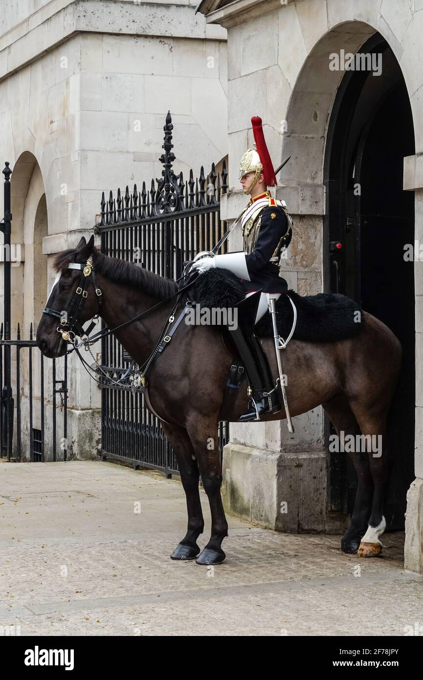A mounted trooper of the Household Cavalry at Horse Guards, Whitehall, London England United Kingdom UK Stock Photo