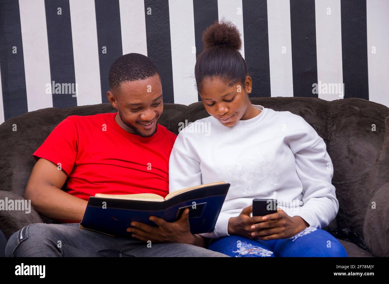 two african student studying their books Stock Photo