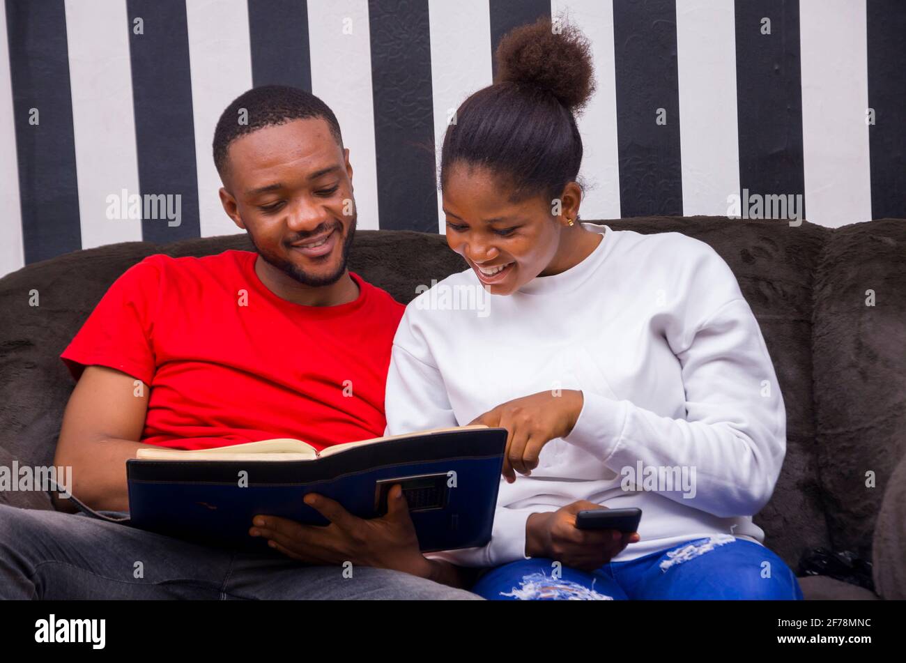 two african student studying their books Stock Photo