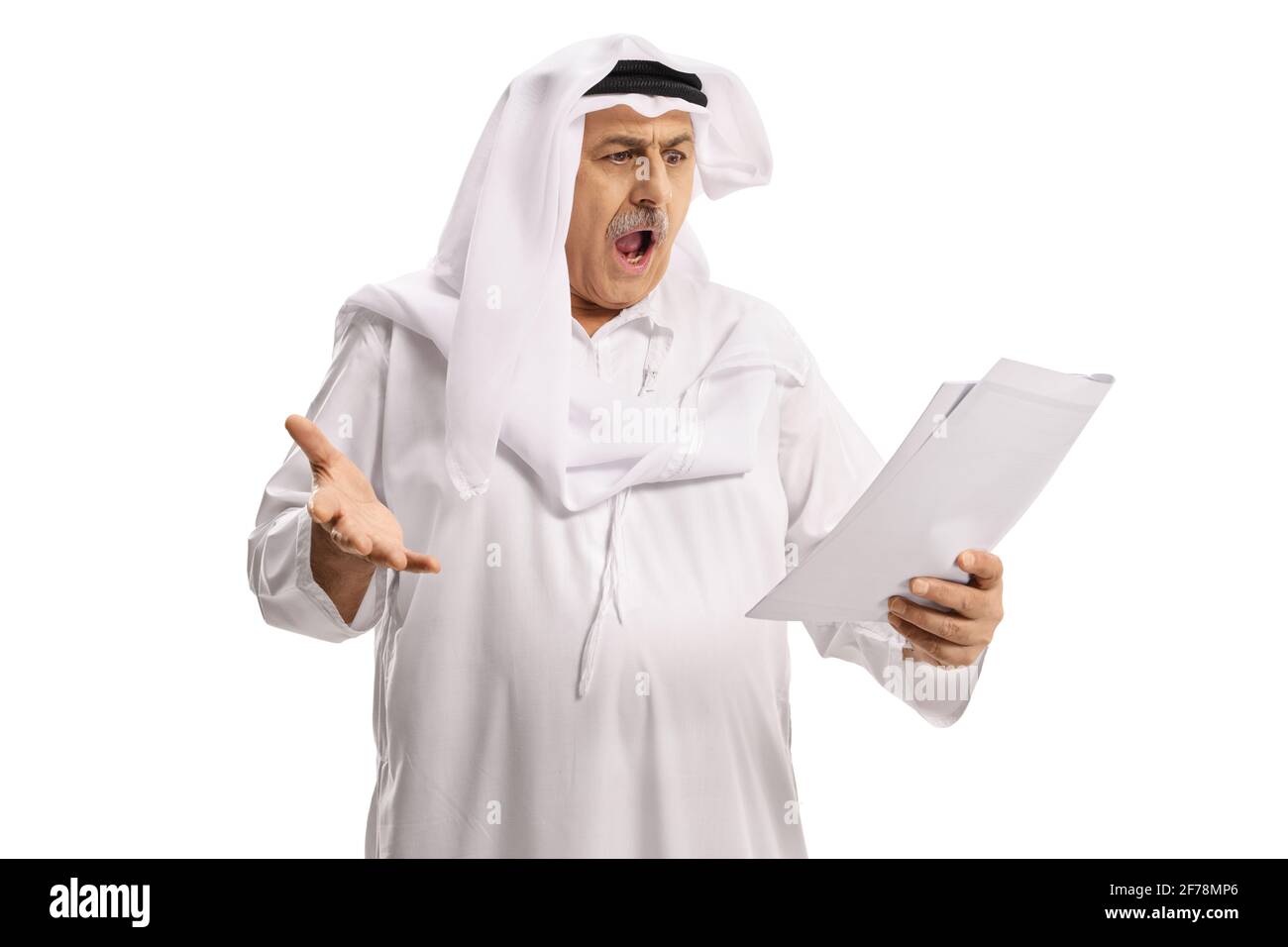 Angry mature arab man holding a paper document isolated on white background Stock Photo