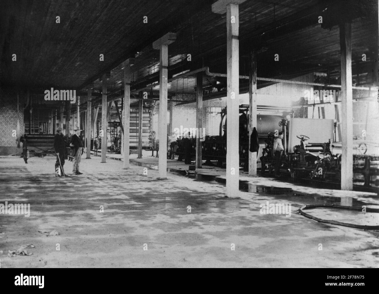 Karlstad's mechanical workshop, Karlstad. The first of the cellulose machiners supplied 1891 to AB G.A. Serlachius, Mäntää, Finland. Work width 2050 millimeter, 2 presses, 9 interpreter cylinders, 2150 milliter in diameter. Stock Photo