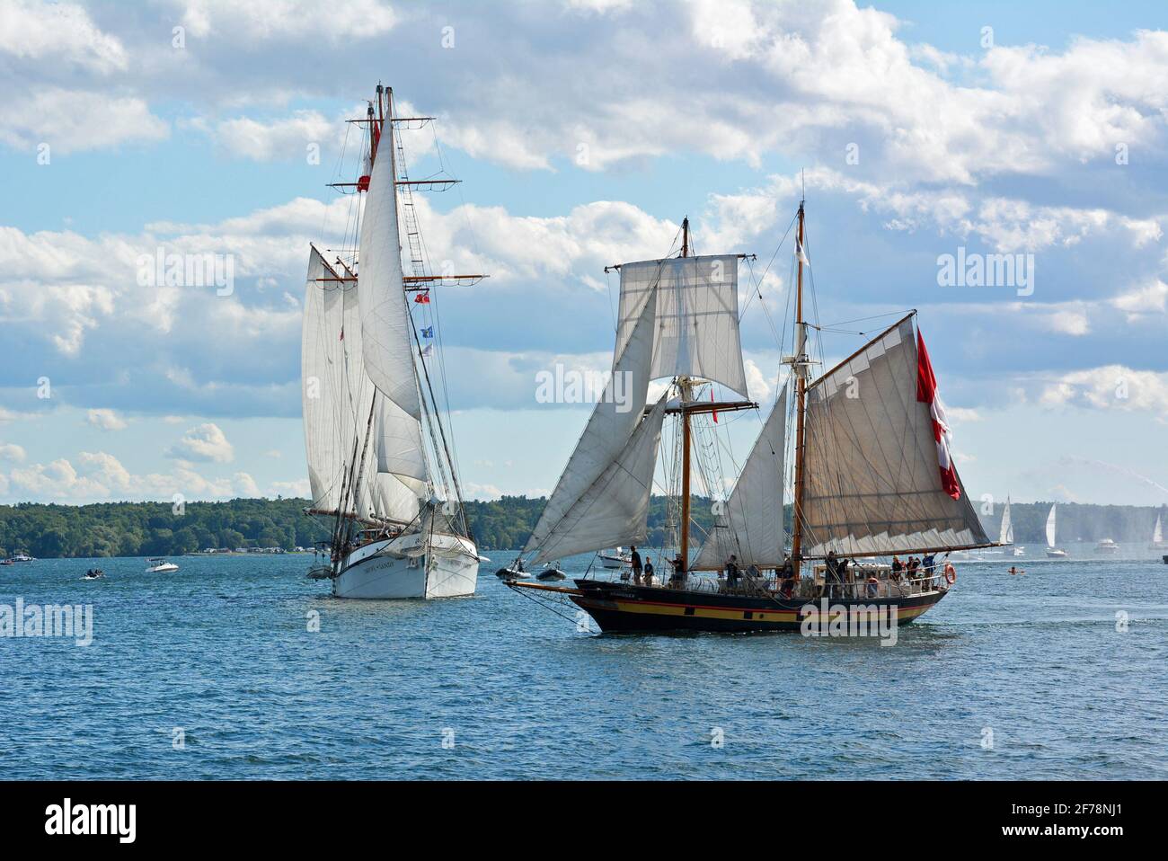 Brockville Canada, takes part in the TALL SHIPS CHALLENGE® Great Lakes Series which takes place in that region every three years and Brockville has been taking part since 2013. The next scheduled Great Lakes Tour will be in 2022.Tall ship, The Tall Ships,including the Bluenose II, and other watercraft at  Brockville Canada. Various views of  tall ship events at the Brockville waterfront at Blockhouse Island Parkway, Centeen Park, and Hardy Park. Stock Photo