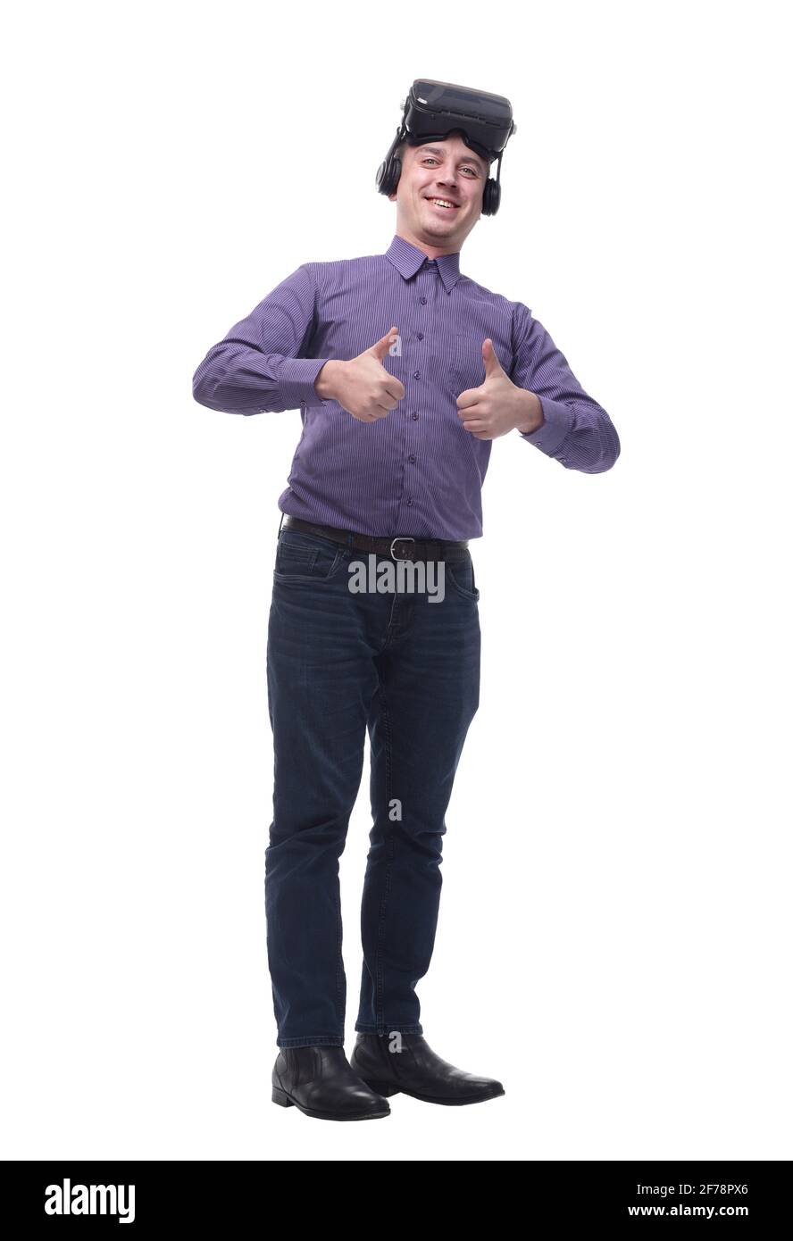 Joyful man giving two thumbs up after using a VR headset Stock Photo