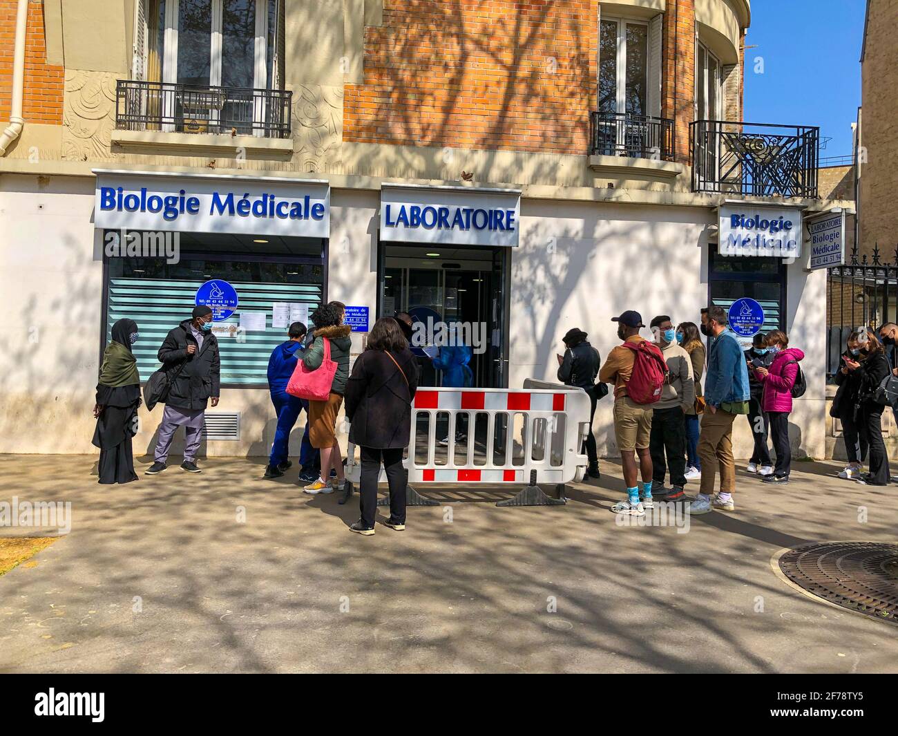 Paris, France, Crowd people Waiting on Line outside Street, for COVID-19 test Laboratory Stock Photo
