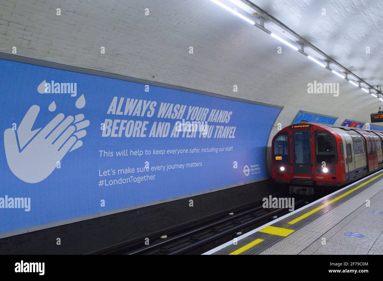 Coronavirus signs on the London underground. Stock Photo