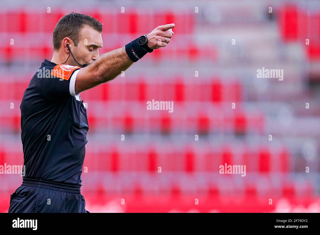 LUIK, BELGIUM - APRIL 4: referee Nicolas Laforge with penalty after ...