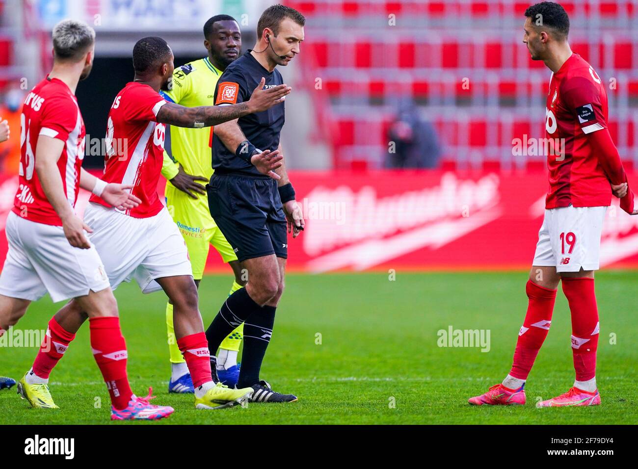 LUIK, BELGIUM - APRIL 4: referee Nicolas Laforge with penalty after ...