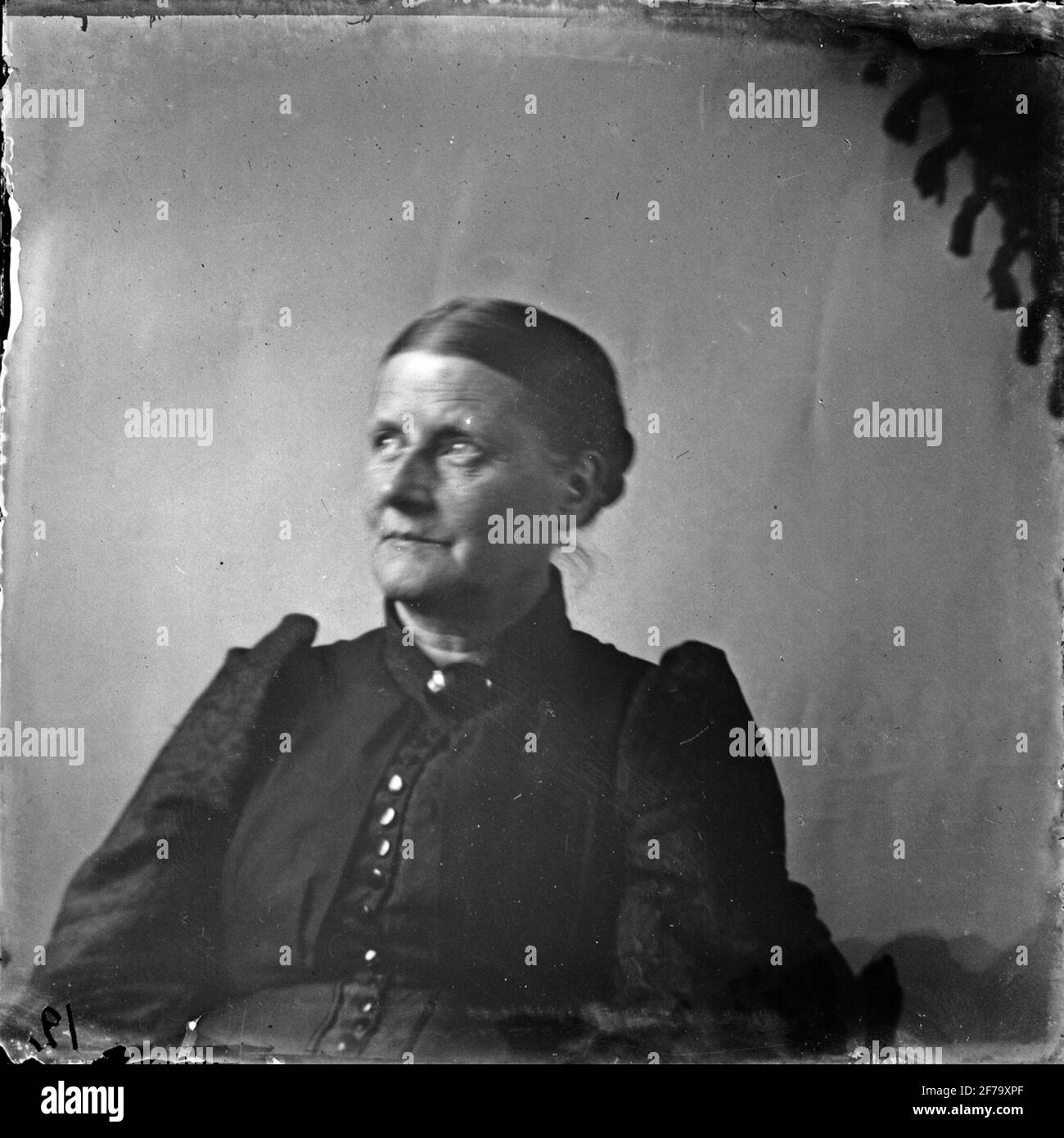 Glass negative, portrait of elderly woman. 'Photos taken with homemade camera (eyeglass lens (unclear, possibly glasses grinding)) about 1894 by G W Cronquist'. Stock Photo