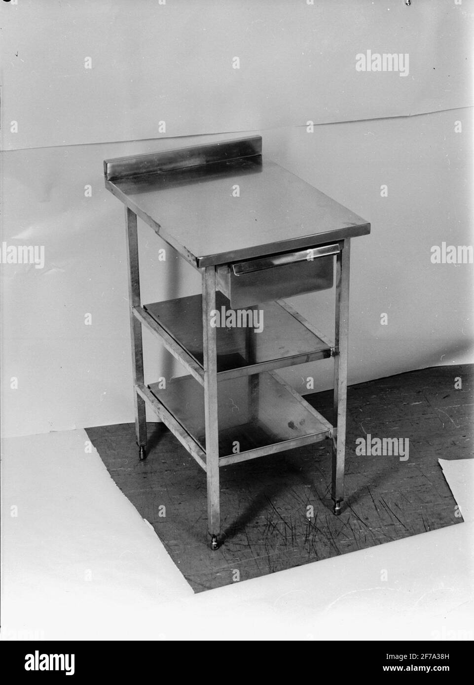 Work table with box and shelves, in stainless steel sheet Stock Photo ...