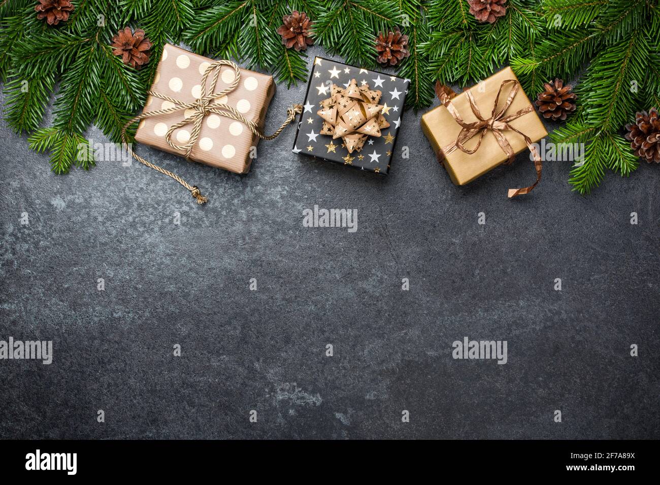 Christmas background with gift boxes and fir branches Stock Photo - Alamy