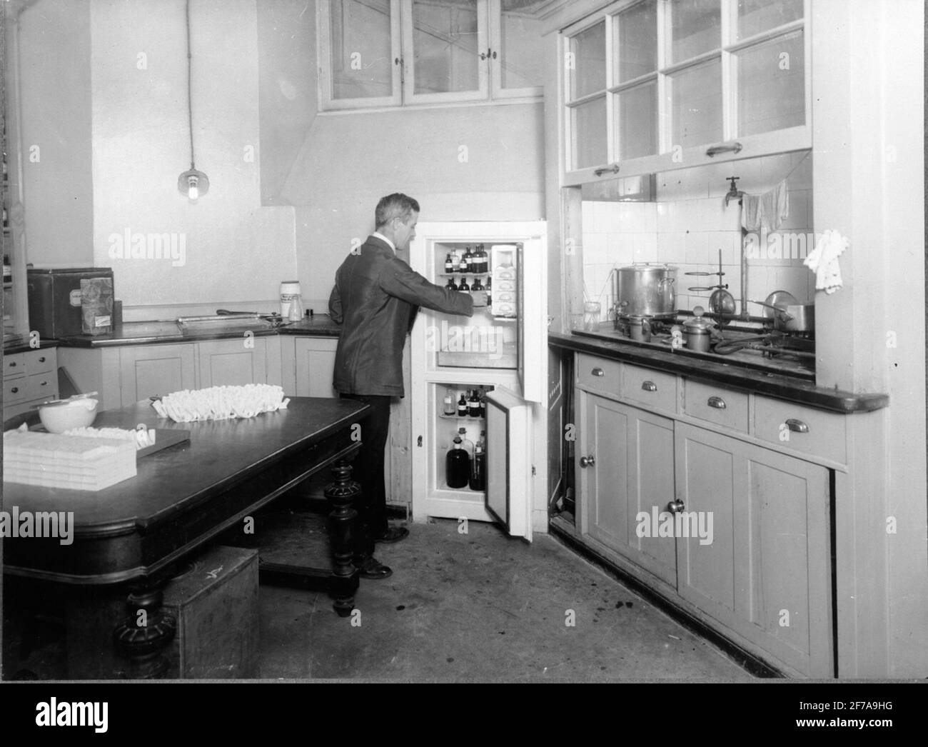 An old refrigerator model in the kitchen environment Stock Photo Alamy