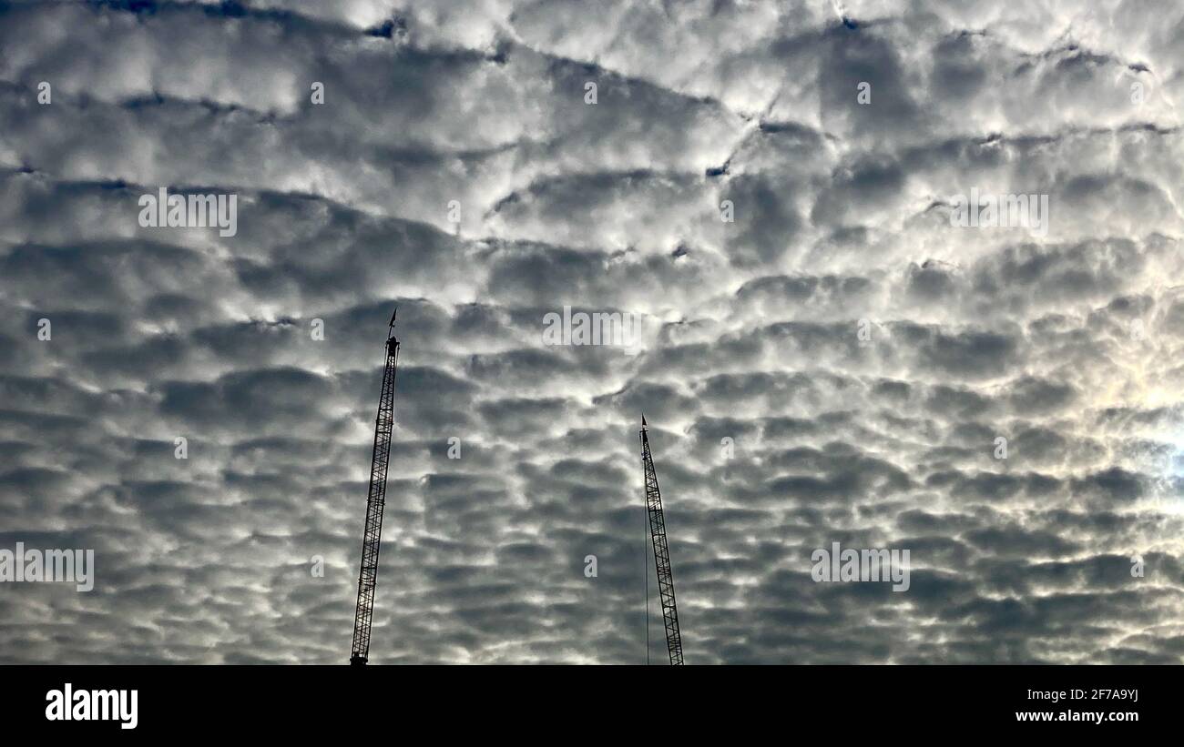 Cirrostratus clouds in the early morning sky in Singapore Stock Photo