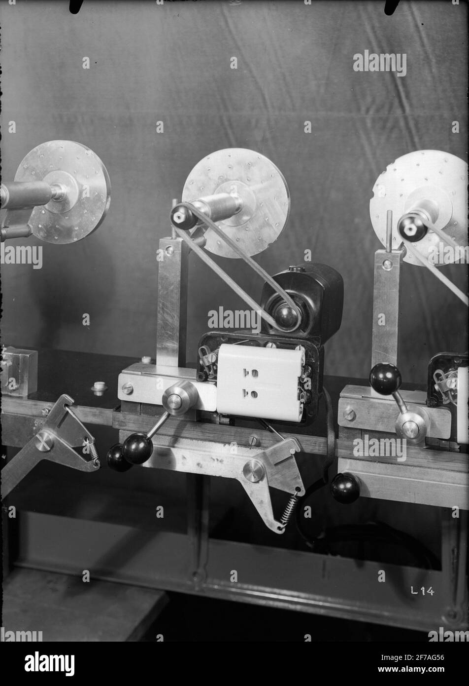 Sewing machine engines testing device Stock Photo Alamy