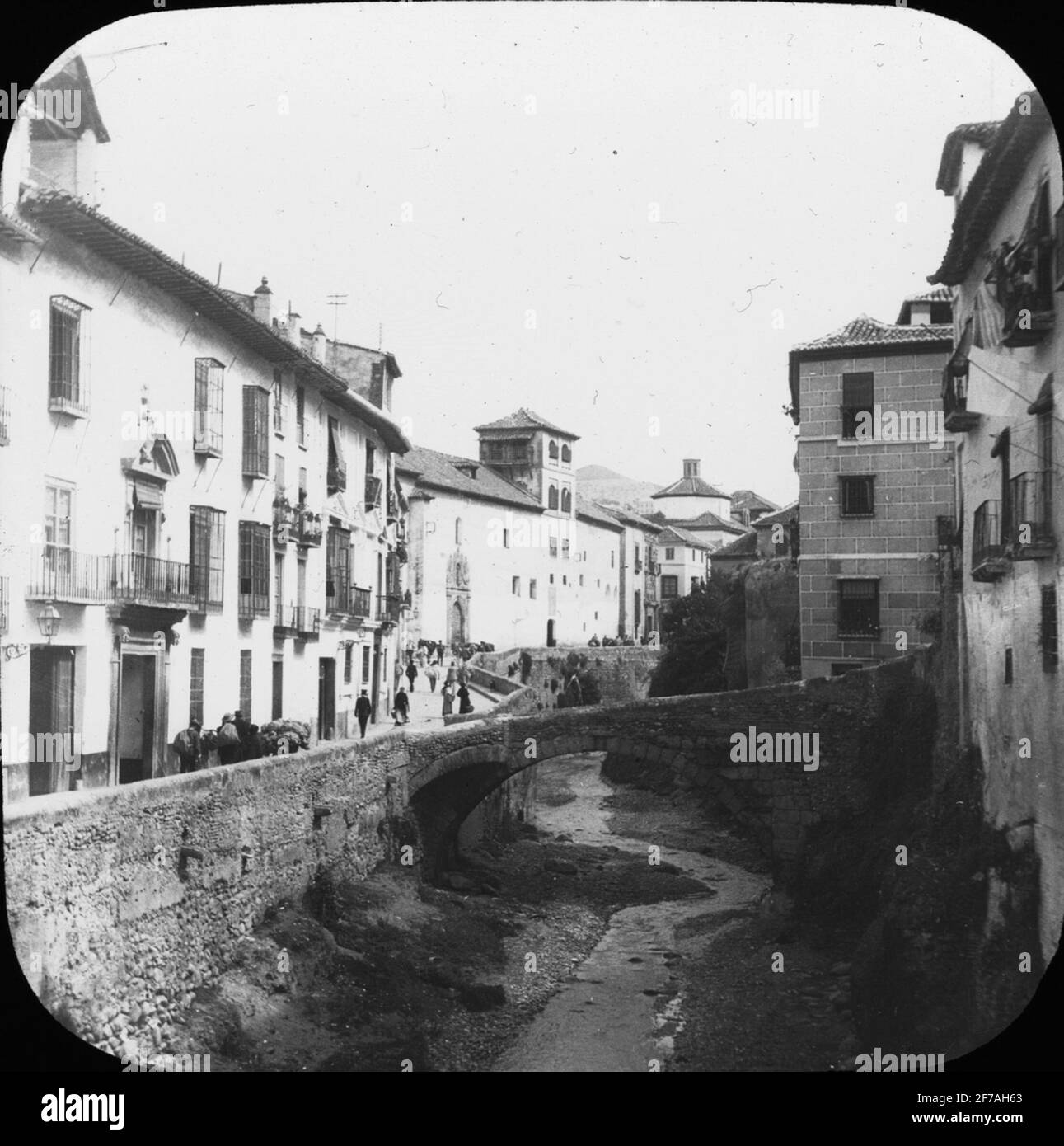 Skiopty icon with motifs of street on the Darro River in Granada.The image has been stored in cardboard labeled: Höstesan 1910. Granada 9. N: 24. Text on image: 'Cerra del Darro'. Stock Photo