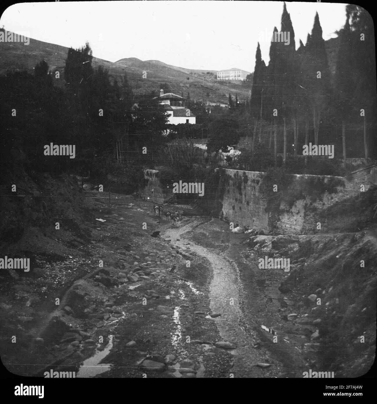 Skiopty icon with motifs of watercourses, Granada image has been stored in cardboard labeled: Höstesan 1910. Granada 9. N: 29. Text on image: 'Darro above Hot Bosque'. Stock Photo