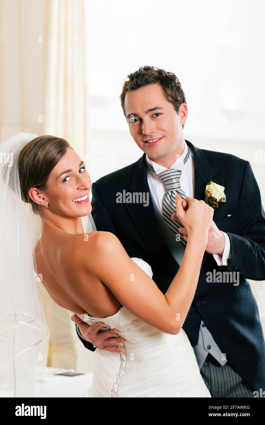 Bride and groom dancing the first dance at their wedding day Stock