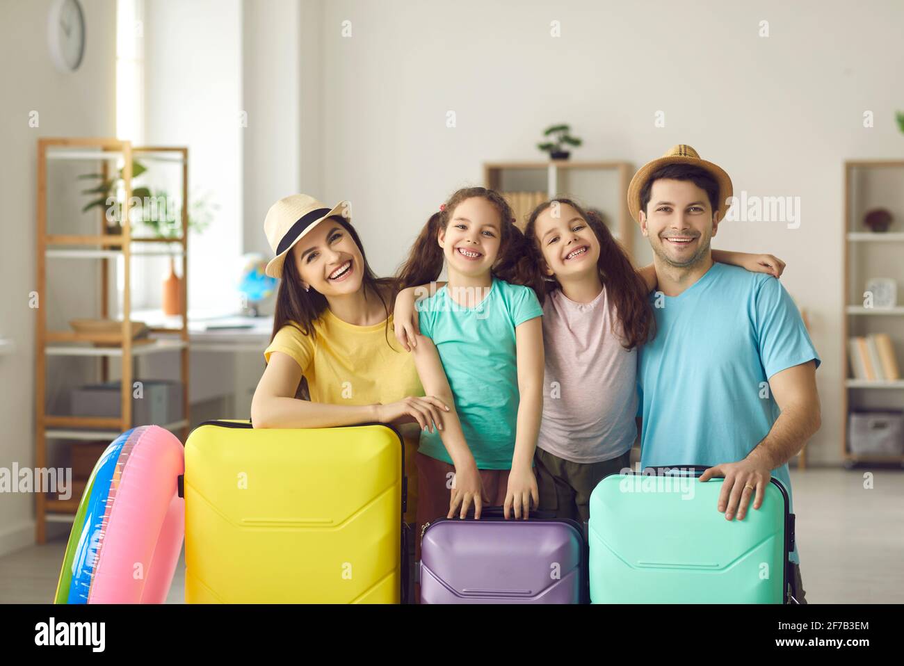 Happy family vacation suitcase hi-res stock photography and images - Alamy