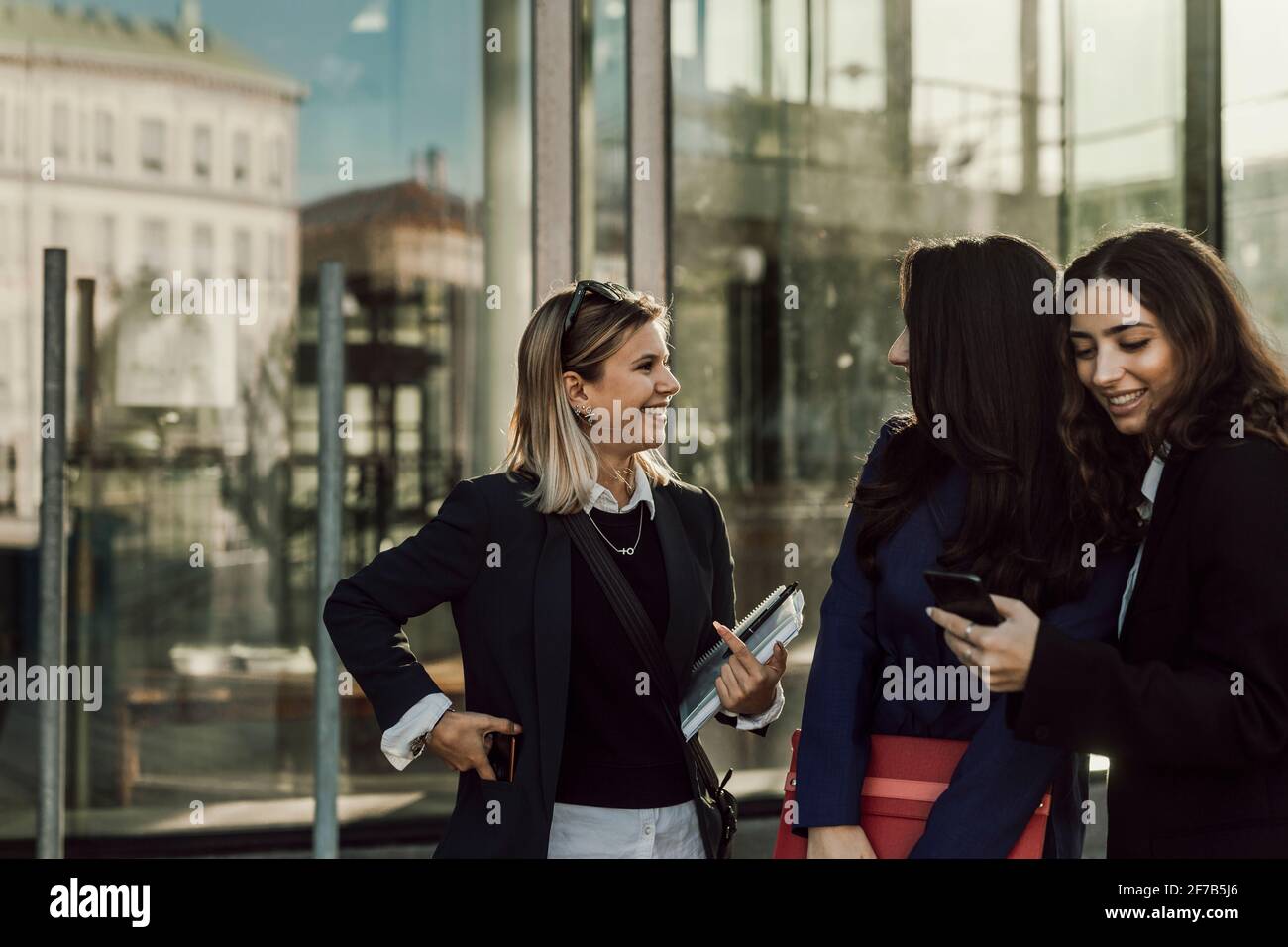 Female coworkers together Stock Photo