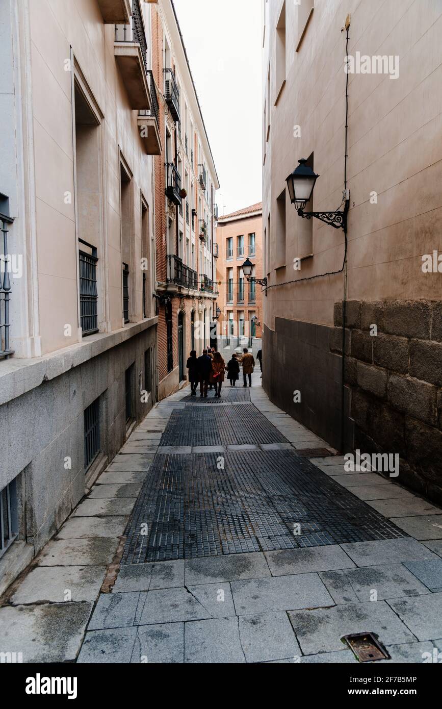 Madrid, Spain - April, 2, 2021: People Walking by Narrow Pedestrian Street  in Central Madrid. Austrias Quarter Stock Photo - Alamy