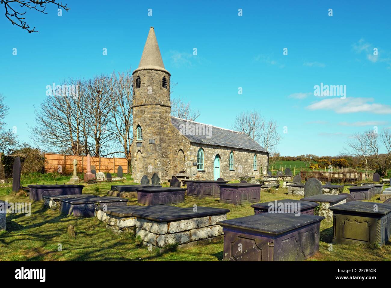 Church of St Gwynin in Llandegwning, North Wales, is a primitive Gothic style church that was rebuilt in 1840. It is now a Grade II listed building. Stock Photo