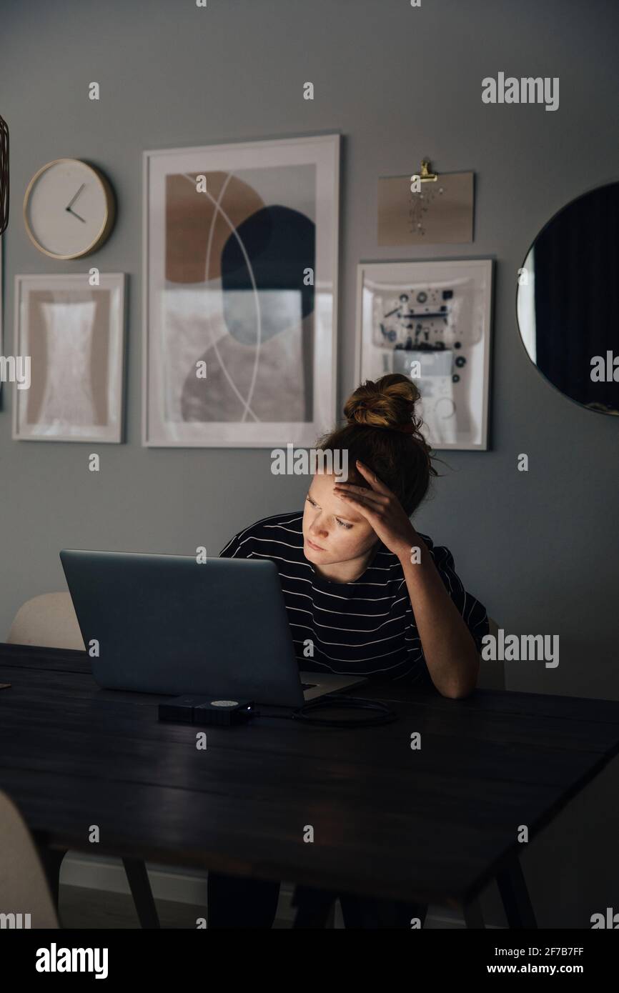 Woman working on laptop Stock Photo
