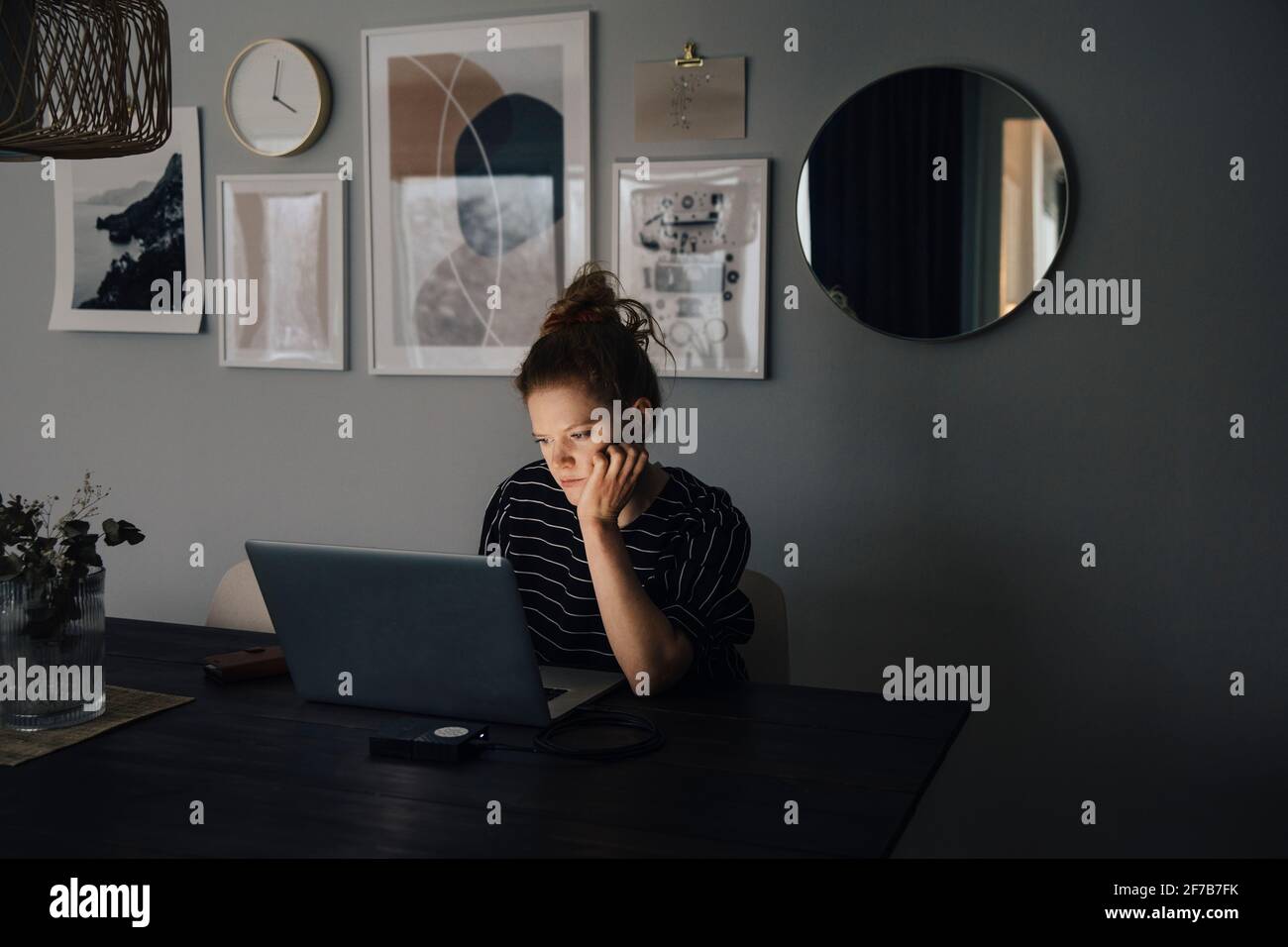 Woman working on laptop Stock Photo