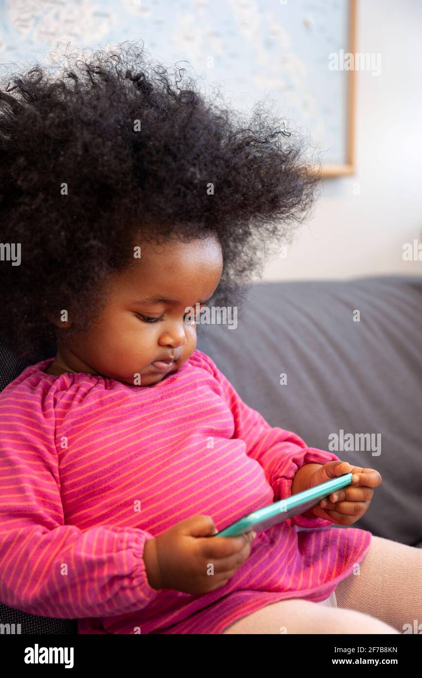 Cute girl with smartphone Stock Photo