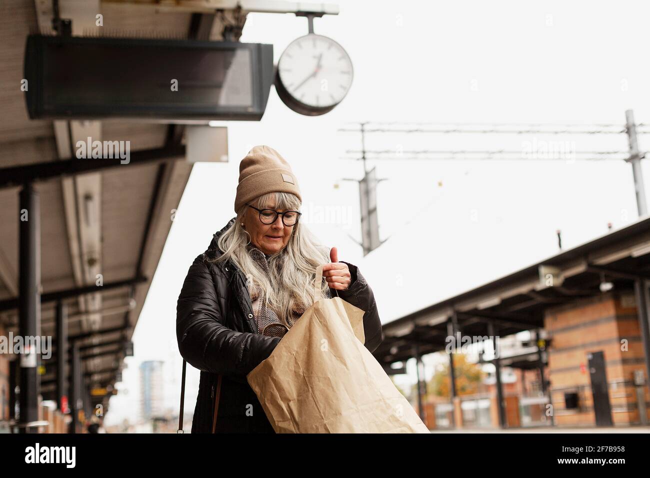 Mature woman on train station hi-res stock photography and images - Alamy