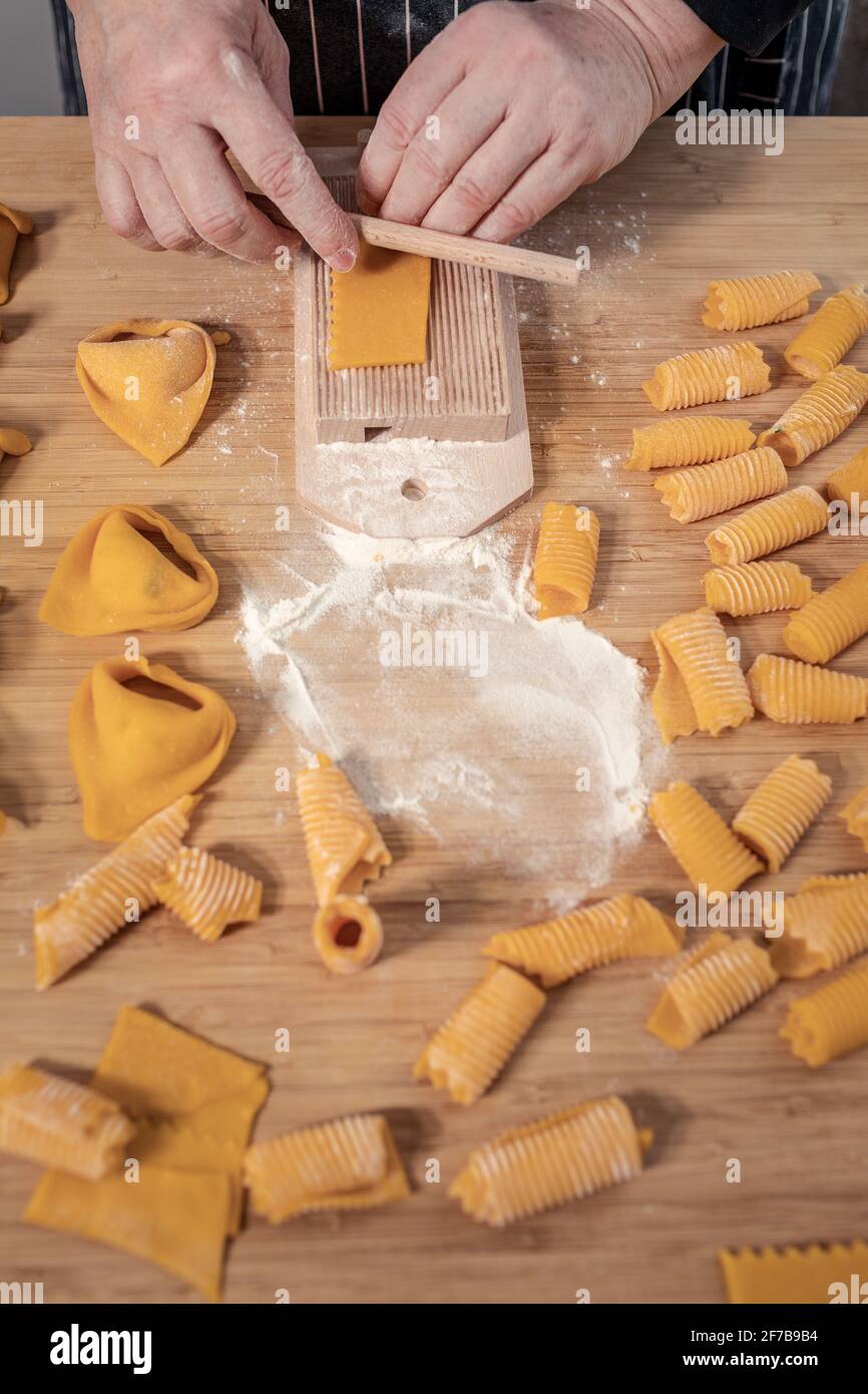 Woman preparing gnocchi Stock Photo
