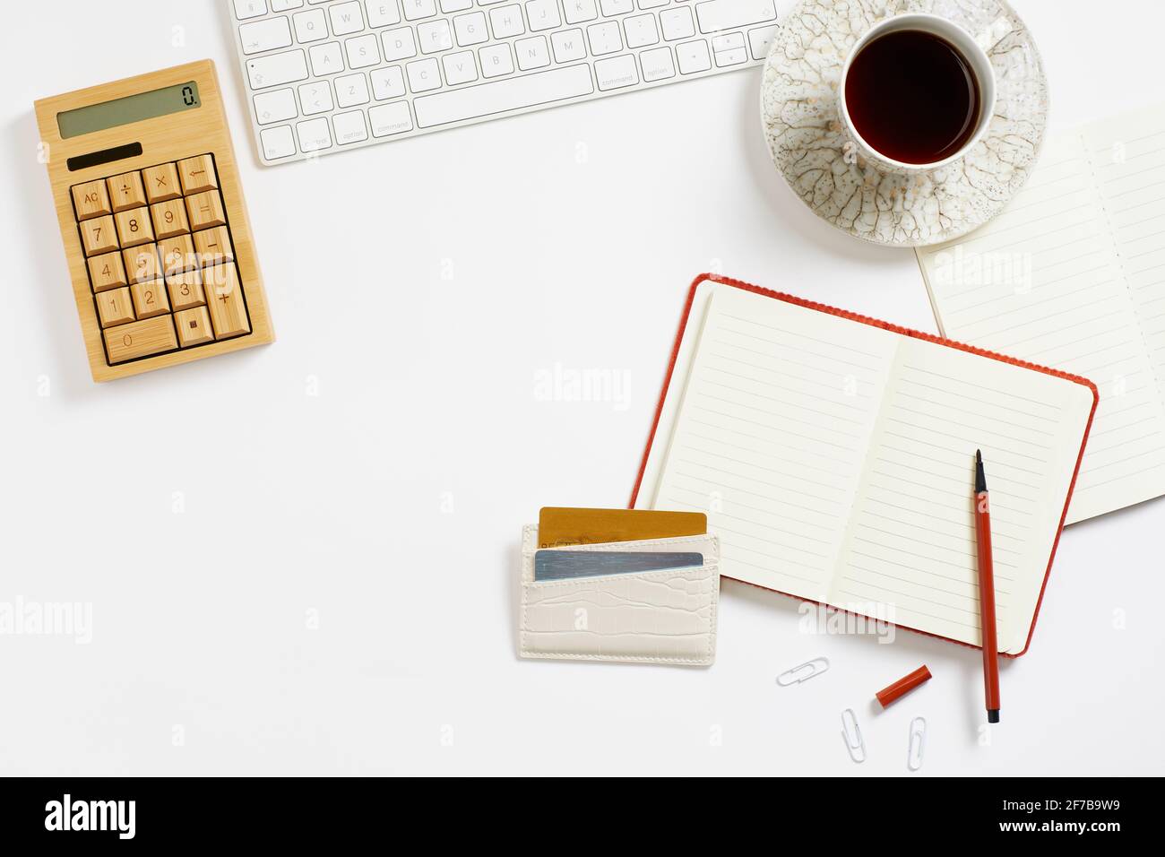 Coffee and notepad on desk Stock Photo