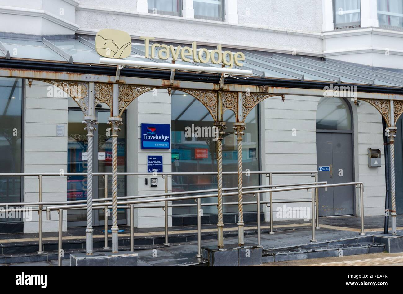 Llandudno, UK: Mar 18, 2021: The Travelodge hotel is located on Gloddaeth Street. Stock Photo
