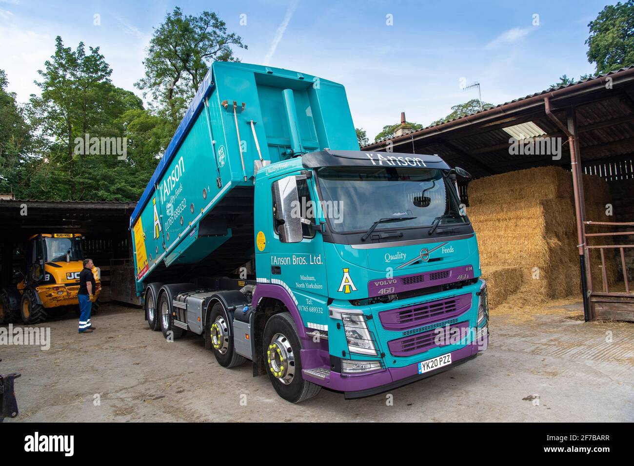Animal feed supplier delivering livestock feed to a hill farm in North