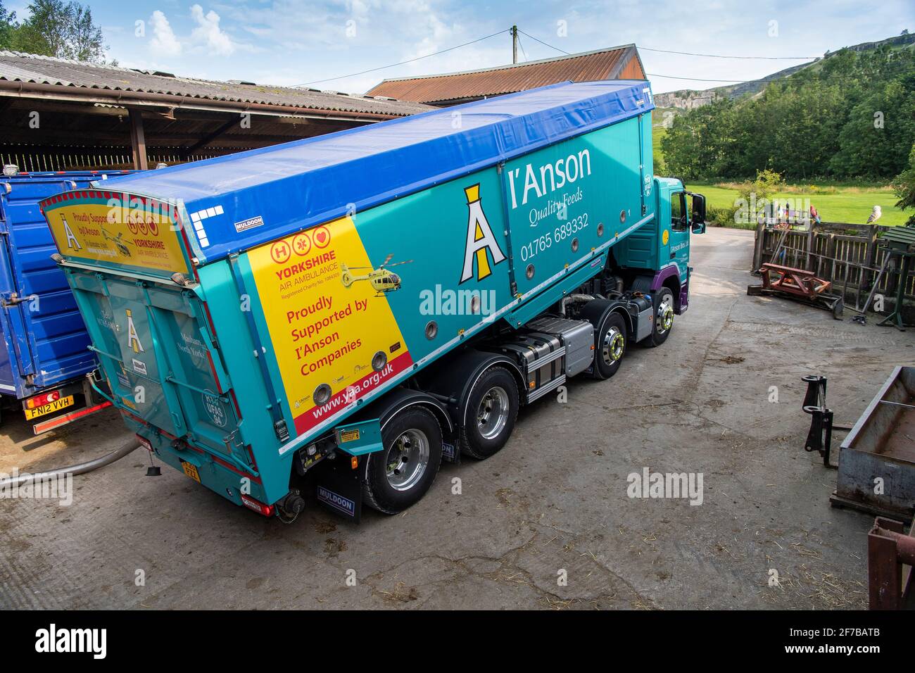 Animal feed supplier delivering livestock feed to a hill farm in North