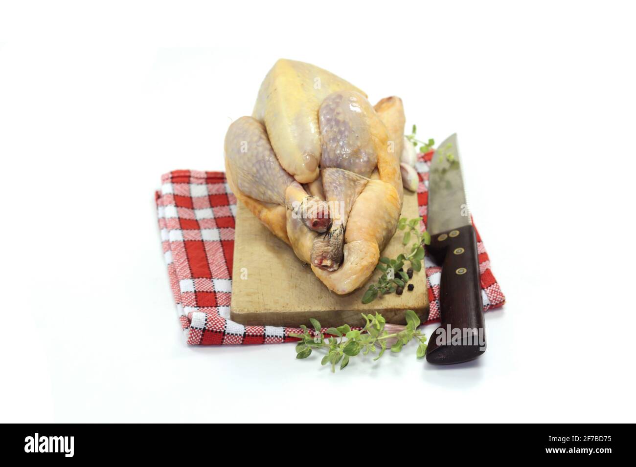 Image showcasing raw guinea fowl Stock Photo - Alamy